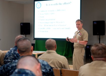 US Navy 100810-N-2218S-019 Capt. John Jones, chief warrant officer (CWO) and limited duty officer (LDO) community manager, briefs prospective CWOs and LDOs in the Community Readiness Center at Commander Fleet Activities Yokosuk