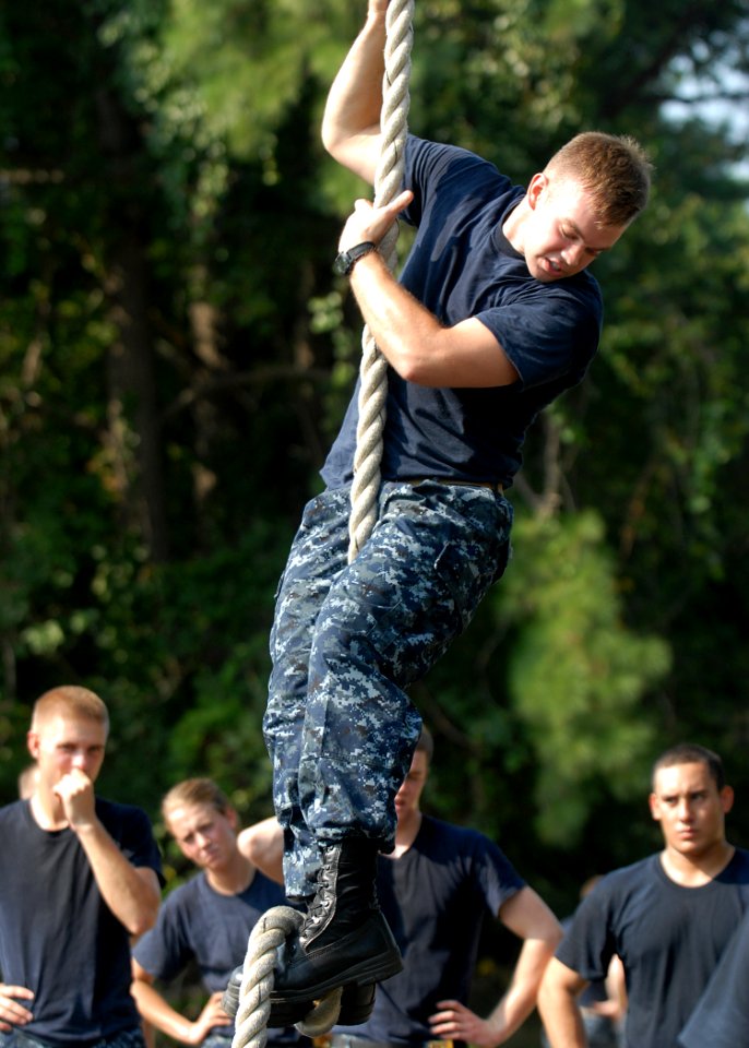 US Navy 100809-N-3857R-002 U.S. Naval Academy midshipmen navigate through the Naval Support Activity Annapolis obstacle course