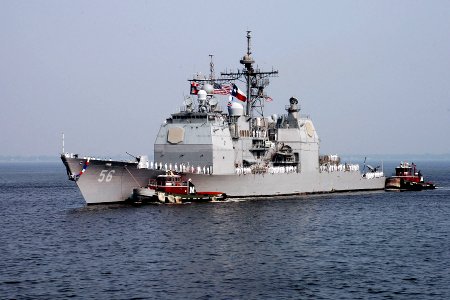 US Navy 100811-N-5292M-429 Sailors aboard the guided-missile cruiser USS San Jacinto (CG 56) man the rails as the ship returns to Naval Station Norfolk after a seven-month deployment to the U.S. 5th and 6th Fleet areas of respo