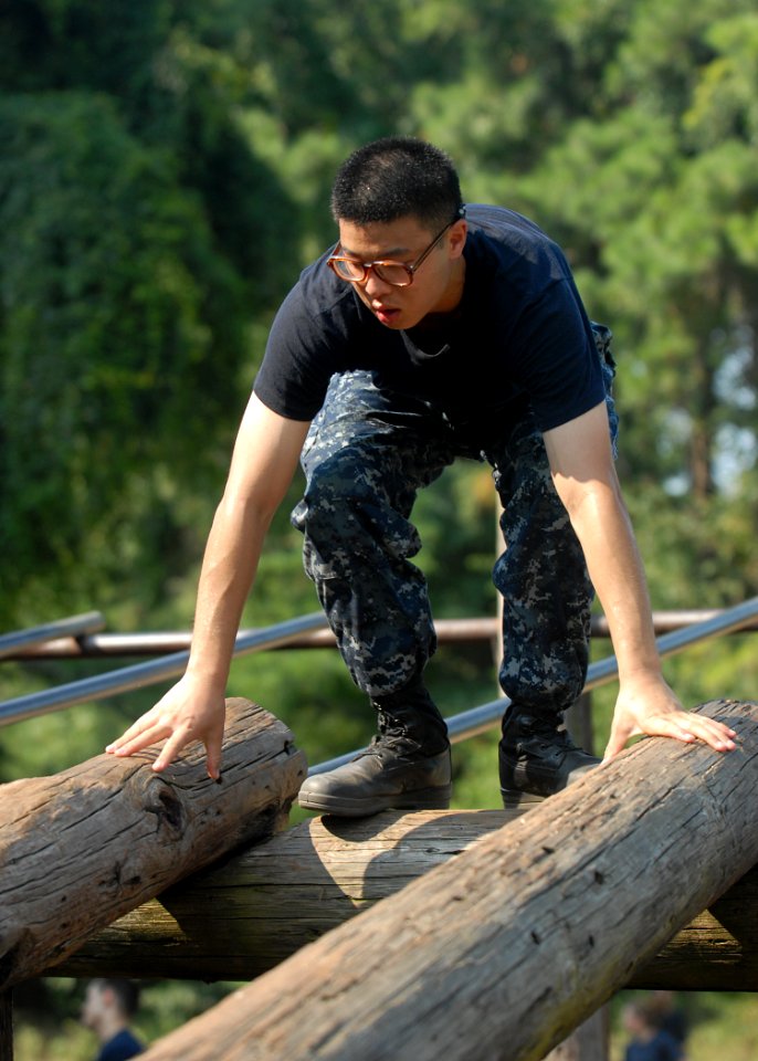 US Navy 100809-N-3857R-001 U.S. Naval Academy midshipmen navigate through the Naval Support Activity Annapolis obstacle course