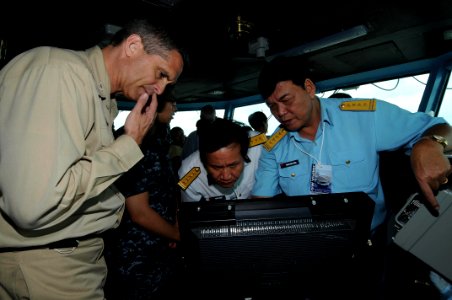 US Navy 100808-N-4830B-020 Capt. David A. Lausman, left, commanding officer of the aircraft carrier USS George Washington (CVN 73)