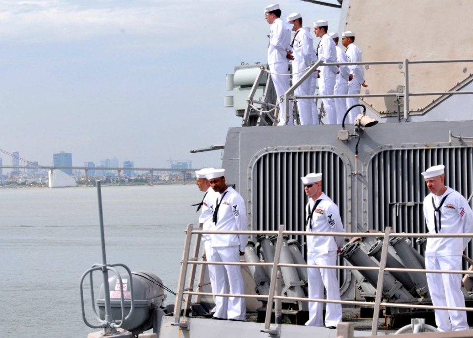 US Navy 100810-N-3215T-084 Sailors aboard USS John S. McCain (DDG 56) man the rails as the ship transits into the port of Da Nang