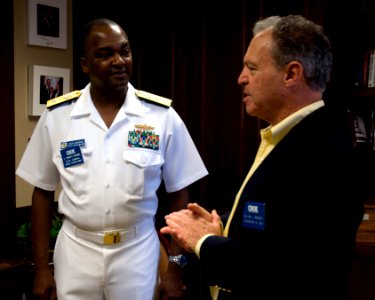 US Navy 100812-N-2389S-014 Rear Adm. Kenneth Carodine meets the president and CEO of the Chicago Board Options Exchange as part of Chicago Navy Week