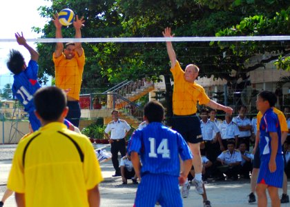 US Navy 100812-N-3589B-198 Sailors assigned to the guided-missile destroyer USS John S. McCain (DDG 56) play volleyball against a team from the Vietnam People's Navy