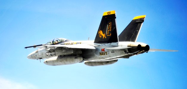 US Navy 100812-N-6003P-106 Capt. James Bynum flies an F-A-18F Super Hornet during an aerial change of command ceremony