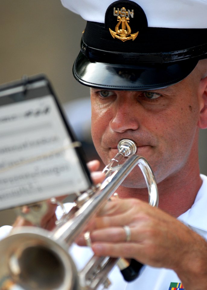 US Navy 100810-N-3857R-001 Musician 1st Class Pasquale Sarracco performs outside of Prince George's Stadium at the 11th annual Navy Night at the Baysox