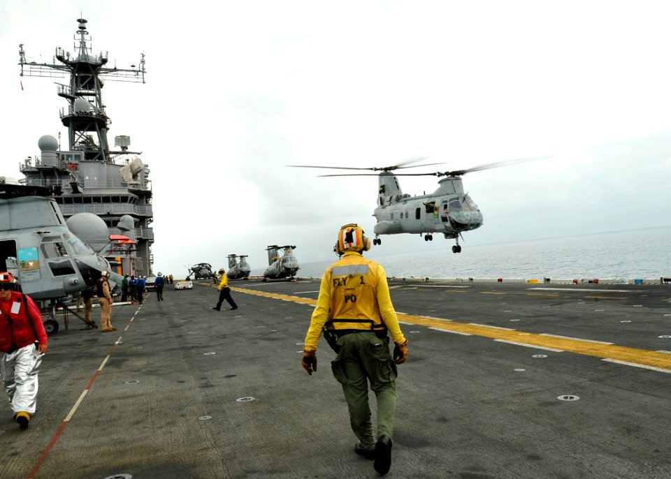 US Navy 100813-N-1226D-058 A CH-46 Sea Knight helicopter launches from USS Peleliu (LHA 5)