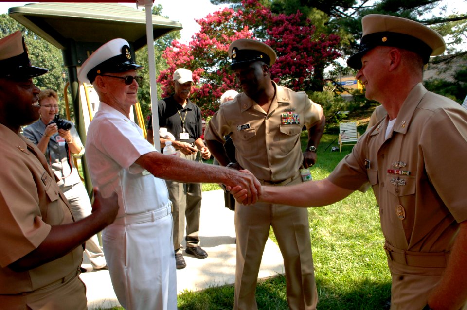 US Navy 100810-N-9818V-199 Master Chief Petty Officer of the Navy (MCPON) Rick West talks with retired Chief Petty Officer Hugo Wingo, 92, at the Armed Forces Retirement Home