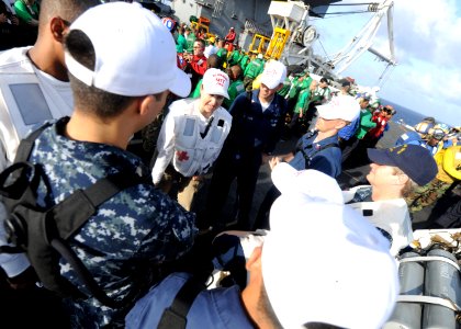 US Navy 100813-N-1287L-004 Lt. Cmdr. Sondra M. Santana briefs members of the medical training team prior to a mass casualty exercise aboard USS Enterprise (CVN 65)