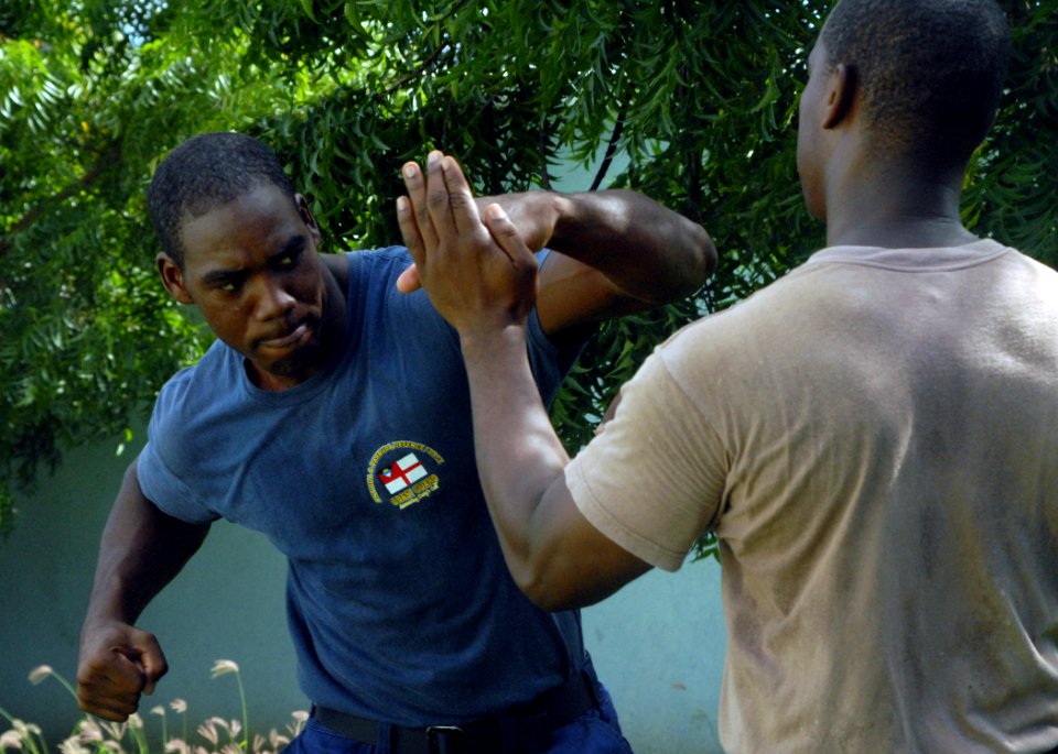 US Navy 100810-N-4971L-234 Members of the Barbados Defense Forces participate in close combat tactics drills with service members deployed aboard High Speed Vessel Swift (HSV 2)