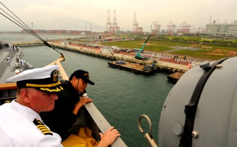 US Navy 100813-N-7280V-229 Capt. Rudy Lupton, left, commanding officer of the U.S. 7th Fleet command ship USS Blue Ridge (LCC 19)