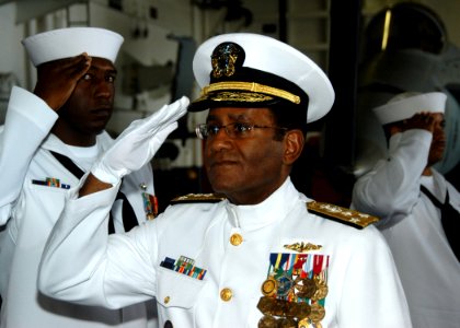 US Navy 100812-N-6764G-046 Vice Adm. Mel Williams Jr., salutes the sideboys during the Commander, U.S. 2nd Fleet change of command ceremony aboard the aircraft carrier USS George H.W. Bush (CVN 77)
