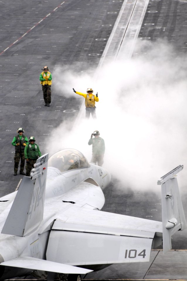 US Navy 100812-N-2918M-020 ear Adm. Robert Girrier, commander of Carrier Strike Group (CSG) 11, and Capt. Scott Conn, commander of Carrier Air wing (CVW) 11,