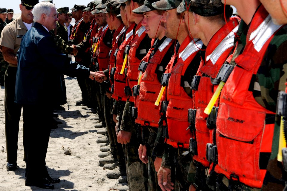 US Navy 100813-N-7883G-099 Secretary of Defense Robert M. Gates congratulates candidates from Basic Underwater Demolition-Sea, Air and Land (BUD-S) class 284 after securing them from Hell Week