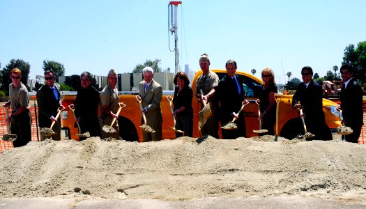 US Navy 100813-N-8607R-040 Honored guests, Naval Base Coronado Commanding Officer Capt. Yancy Lindsey and U.S. Rep. Susan Davis (D-Calf.) break ground for the construction of the new combined bachelor housing facility at Naval photo