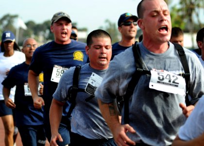 US Navy 100818-N-2055M-122 Chief selectees from Guided Missile Cruiser Squadron and Afloat Training Group San Diego sing cadence during a 5-kilometer run during Surface Line Week 2010 at Naval Base San Diego