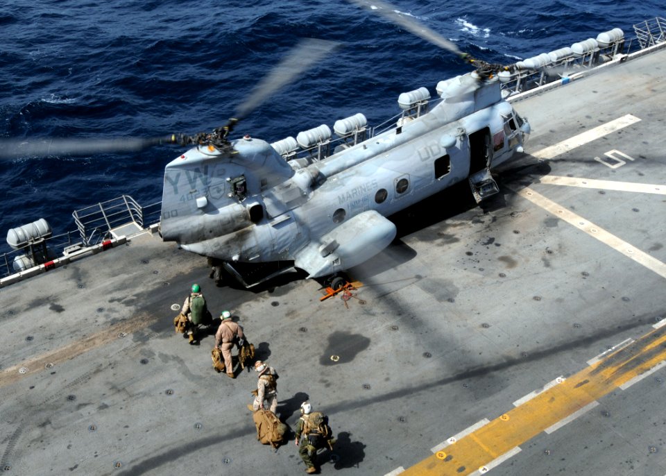 US Navy 100818-N-3729D-014 Marines embark a CH-46 Sea Knight helicopter assigned to the White Knights of Helicopter Marine Medium Squadron (HMM 165) (Reinforced)