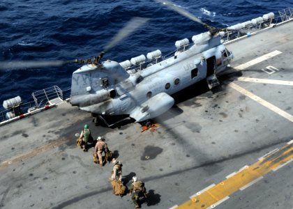 US Navy 100818-N-3729D-014 Marines embark a CH-46 Sea Knight helicopter assigned to the White Knights of Helicopter Marine Medium Squadron (HMM 165) (Reinforced)