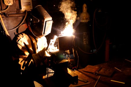 US Navy 100816-N-6552M-033 Hull Technician 3rd Class Jesse Roberts participates in a welding contest during Surface Line Week 2010