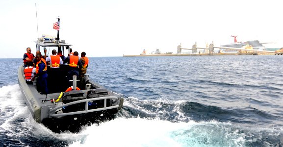 US Navy 100818-N-9643W-247 Sailors from the U.S. Navy and the Royal Barbados Defense Force ride in a rigid-hull inflatable boat during a Naval Criminal Investigative Service subject matter expert exchange photo