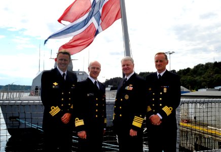US Navy 100816-N-8273J-095 Chief of Naval Operations (CNO) Adm. Gary Roughead stands with Chief of the Royal Norwegian Navy Rear Adm. Haakon Bruun-Hanssen and other senior leadership aboard HNoMS Otto Sverdrup (F 312) photo