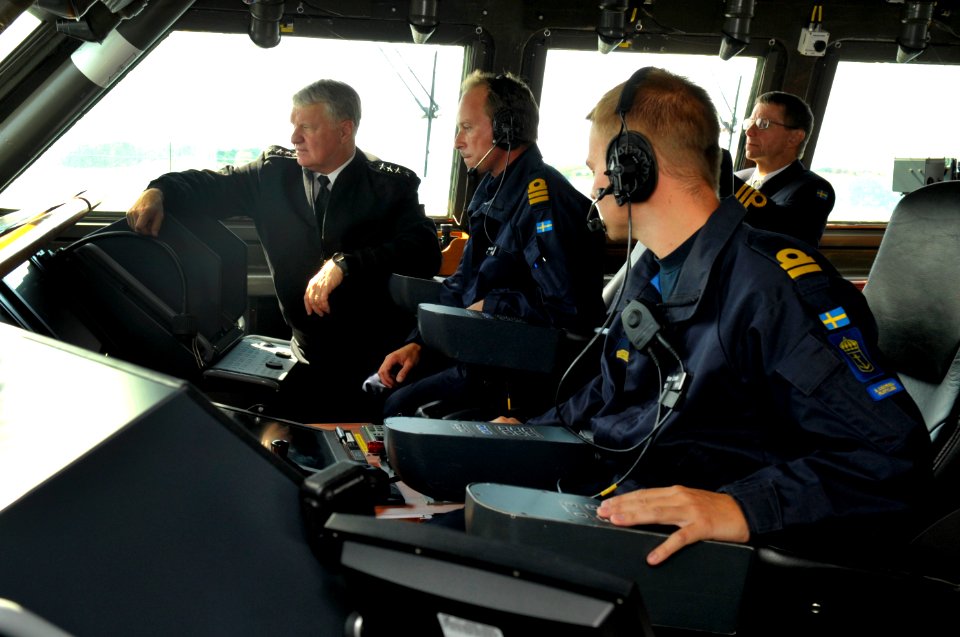 US Navy 100819-N-8273J-085 On the bridge, Chief of Naval Operations (CNO) Adm. Gary Roughead, left, looks on as the crew members of the Visby Corvette HSwMS NYKOPING get underway
