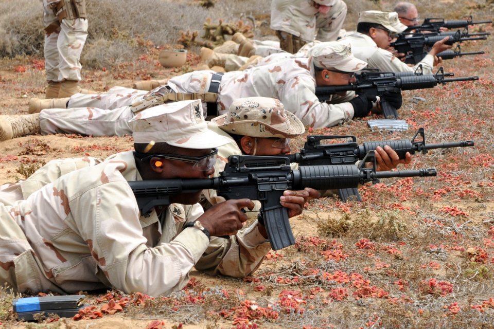 US Navy 100817-N-9123L-090 Reserve Component Sailors assigned to Maritime Expeditionary Security Squadron (MSRON) 1 fire M-4 carbines