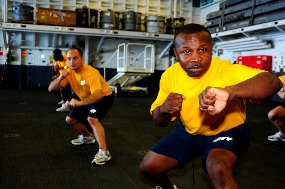 US Navy 100817-N-3852A-543 Chief Warrant Officer Benny Brockington participates in a Security Reaction Force-Basic training session aboard the amphibious assault ship USS Wasp (LHD 1)