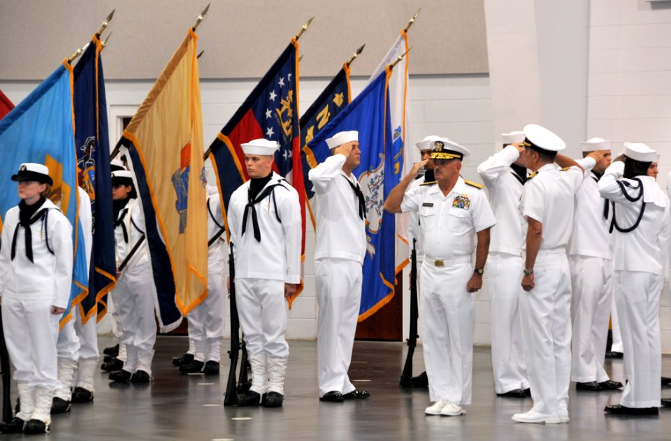 US Navy 100820-N-8848T-050 Rear Adm. Joseph F. Kilkenny salutes during arrival honors at the weekly Pass In Review graduation ceremony at Recruit Training Command in Great Lakes, Ill