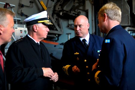 US Navy 100819-N-8273J-066 Chief of Naval Operations (CNO) Adm. Gary Roughead, left, speaks with Rear Adm. Anders Grenstad, Chief of Staff of the Royal Swedish Navy photo