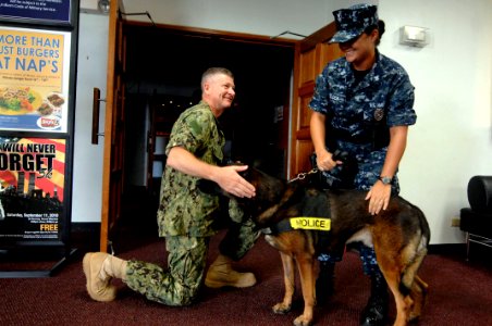 US Navy 100820-N-9818V-122 Master Chief Petty Officer of the Navy (MCPON) Rick West meets Master-at-Arms 2nd Class Shannon Golden, assigned to the security department of Naval Base Guam photo