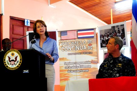 US Navy 100821-N-1531D-200 Capt. Thomas Negus, commodore of Continuing Promise 2010, watches as U.S. Ambassador to Costa Rica Anne Andrews delivers remarks during the opening ceremony of the Costa Rica phase of Continuing Promi photo