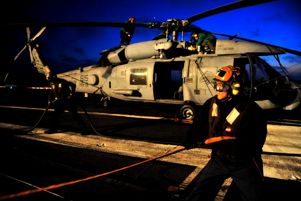 US Navy 100822-N-2953W-162 Sailors participate in a late night fire drill aboard the aircraft carrier USS Carl Vinson (CVN 70)
