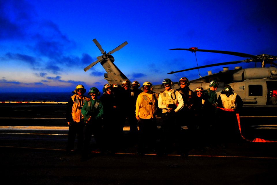 US Navy 100822-N-2953W-081 Sailors participate in a late night fire drill aboard the aircraft carrier USS Carl Vinson (CVN 70)