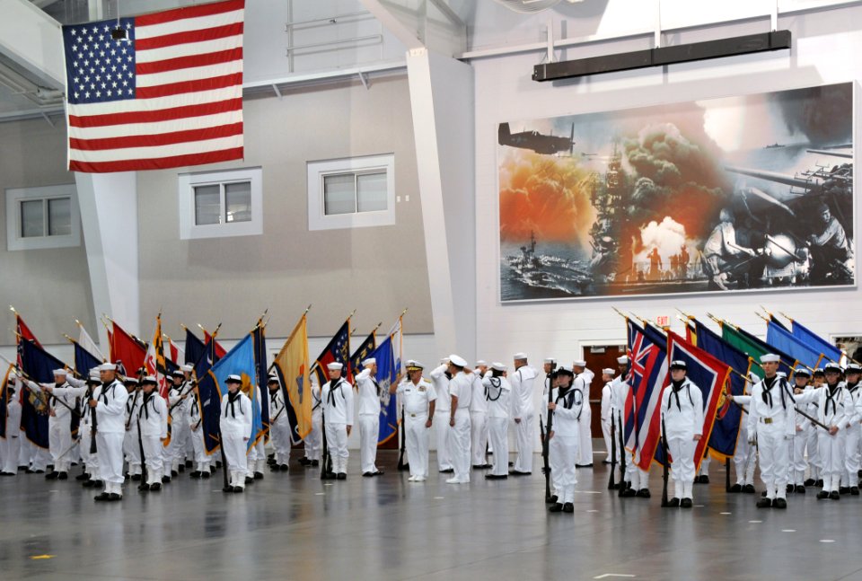 US Navy 100820-N-8848T-052 Rear Adm. Joseph F. Kilkenny salutes during arrival honors at the weekly Pass In Review graduation ceremony at Recruit Training Command in Great Lakes, Ill