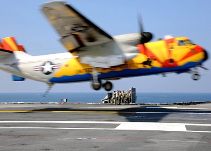 US Navy 100820-N-3885H-100 Landing signal officers aboard the aircraft carrier USS George H.W. Bush (CVN 77) watch as a C-2A Greyhound assigned to Fleet Logistics Support Squadron (VRC) 40 lands