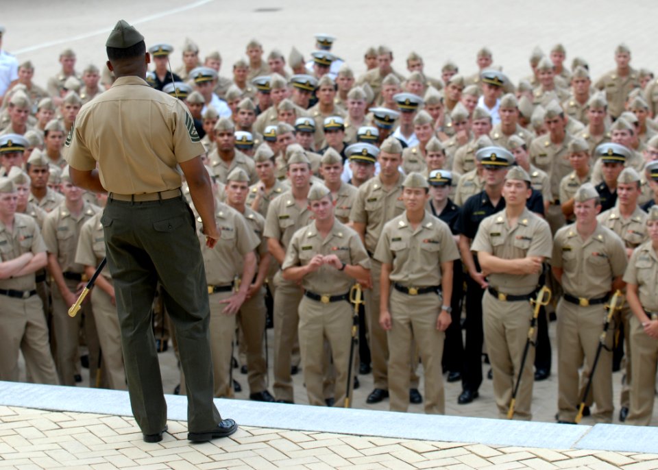 US Navy 100823-N-3857R-009 Gunnery Sgt. Terrance Jordan gives a drill instruction to U.S. Naval Academy Midshipmen stripers in Techumseh Court at the U.S. Navy Academy