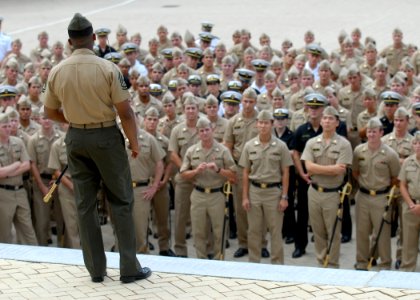 US Navy 100823-N-3857R-009 Gunnery Sgt. Terrance Jordan gives a drill instruction to U.S. Naval Academy Midshipmen stripers in Techumseh Court at the U.S. Navy Academy photo