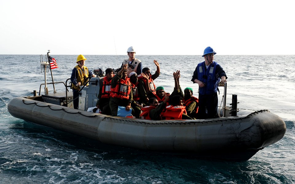 US Navy 100820-N-6362C-073 Eight mariners wave farewell to Sailors aboard the aircraft carrier USS Harry S. Truman (CVN 75) as they are transported to the Iranian navy ship Chiroo