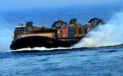 US Navy 100823-N-7948R-159 A landing craft air cushion approaches the amphibious dock landing ship USS Pearl Harbor (LSD 52). Pearl Harbor is part of the Peleliu Amphibious Ready Group