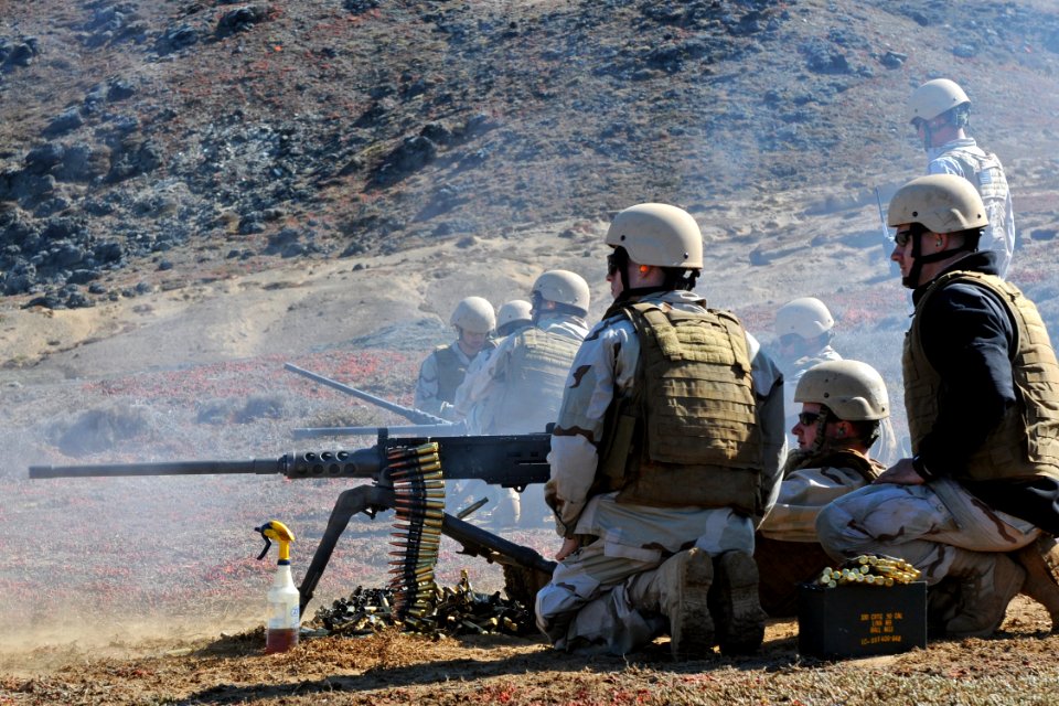 US Navy 100820-N-9123L-057 Navy Reserve Sailors fire an M2HB .50-caliber machine gun during a live-fire exercise