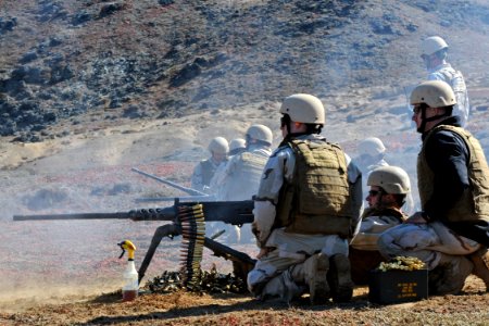 US Navy 100820-N-9123L-057 Navy Reserve Sailors fire an M2HB .50-caliber machine gun during a live-fire exercise