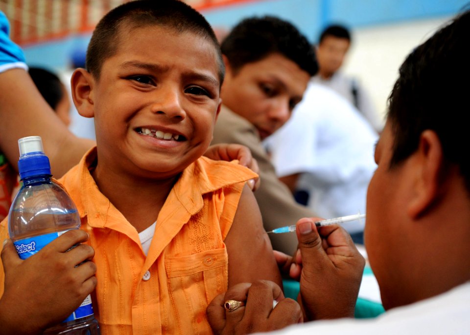 US Navy 100822-N-4153W-348 A Costa Rican boy receives a shot from a Costa Rican nurse during a Pacific Partnership 2010 community service event