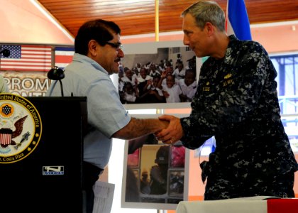 US Navy 100821-N-4153W-151 Capt. Thomas Negus, commodore of Continuing Promise 2010, meets with the mayor of Limon, Costa Rica, Eduardo Barboza, during the opening ceremony for Continuing Promise 2010