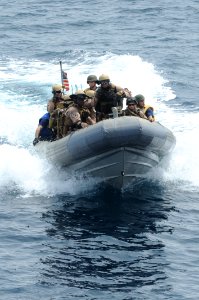 US Navy 100821-N-6463B-231 Members of the U.S. Coast Guard Tactical Law Enforcement and the visit, board, search and seizure team embarked aboard USS Princeton (CG 59) engage in a mock assault operation in the Red Sea