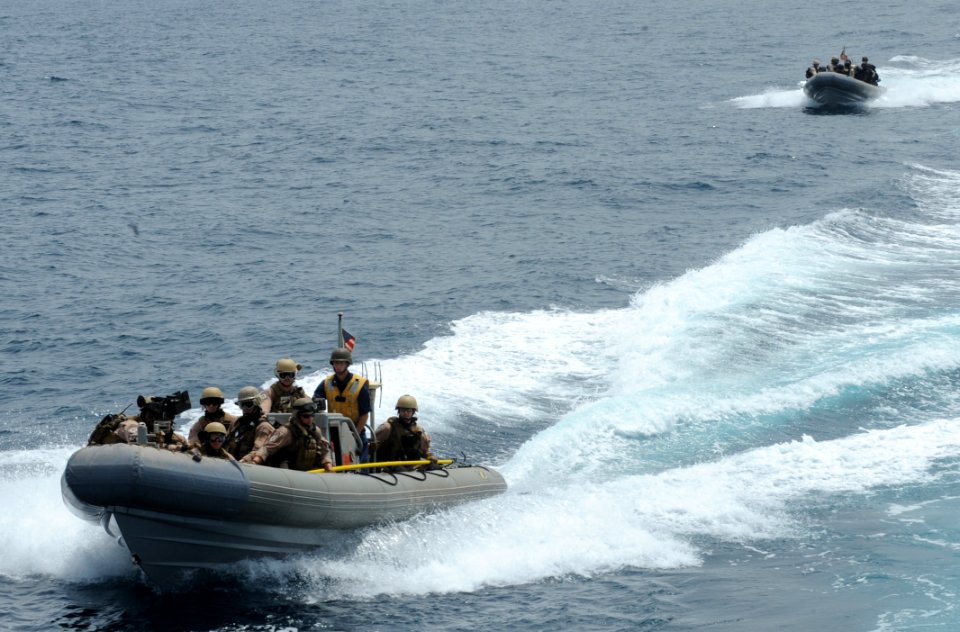 US Navy 100821-N-6463B-196 Members of the U.S. Coast Guard Tactical Law Enforcement and the visit, board, search and seizure team embarked aboard USS Princeton (CG 59) engage in a mock assault operation in the Red Sea