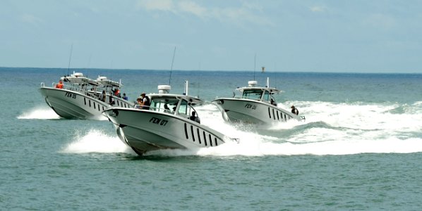 US Navy 100825-N-8546L-339 Sailors assigned to the Fuerza Especial Naval (FEN) of the Guatemalan Navy pilot maritime patrol boats in a diamond formation to demonstrate what they've learned during two weeks of training