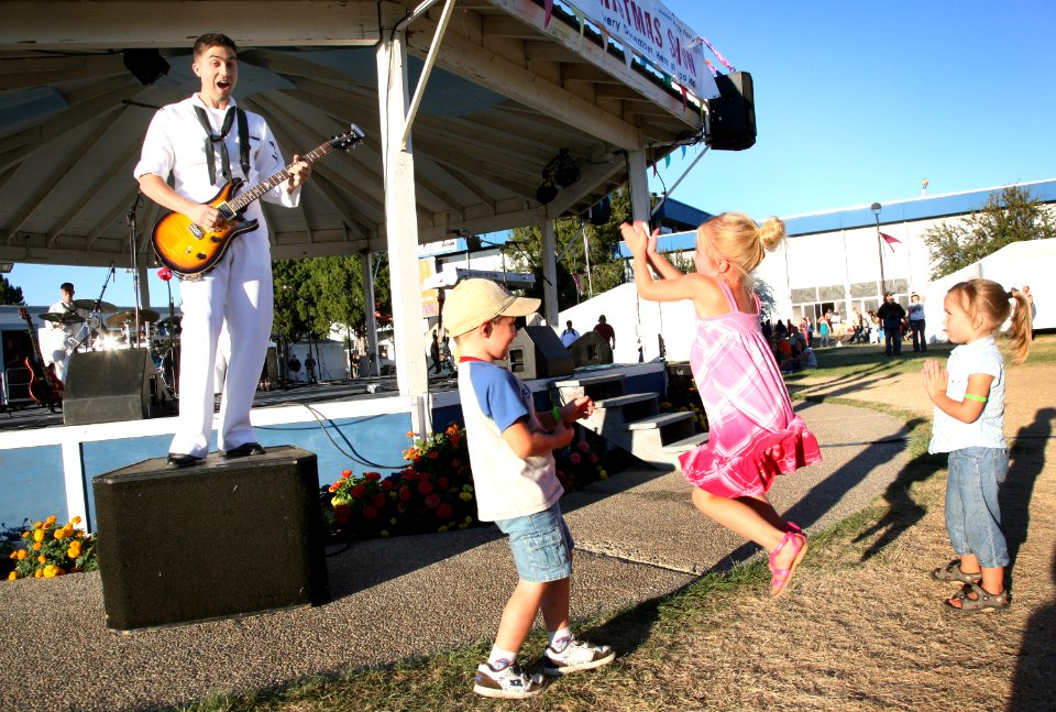 US Navy 100823-N-3271W-070 Musician 3rd Class Clifton Murray performs with members of the U.S. Navy Band Northwest, Passage, at the Western Idaho Fair during Boise Navy Week