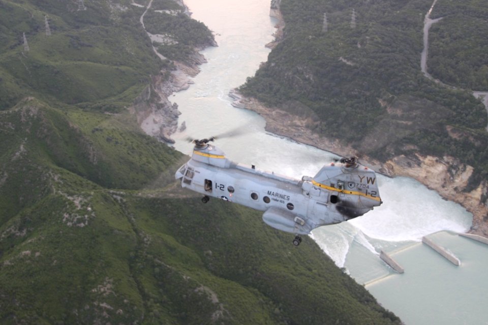 US Navy 100827-M-3497D-990 A Marine Corps CH-46E Sea Knight helicopter flies over the Tarbela Damn en route to Kohistan, Pakistan, during humanitarian relief efforts in Khyber-Pakhtunkhwa Province, Pakistan