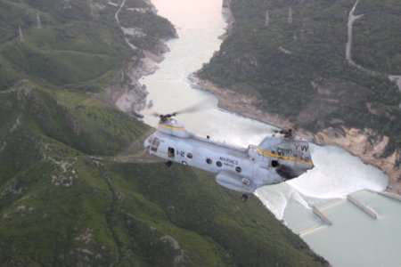 US Navy 100827-M-3497D-990 A Marine Corps CH-46E Sea Knight helicopter flies over the Tarbela Damn en route to Kohistan, Pakistan, during humanitarian relief efforts in Khyber-Pakhtunkhwa Province, Pakistan